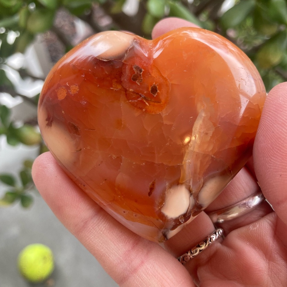 Stunning polished carnelian heart palmstone